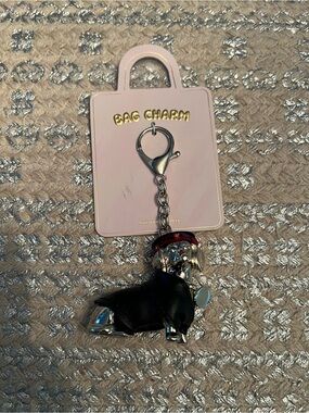 Anthropologie Dachshund Dog Bag Charm with Black Coat and Red Hat